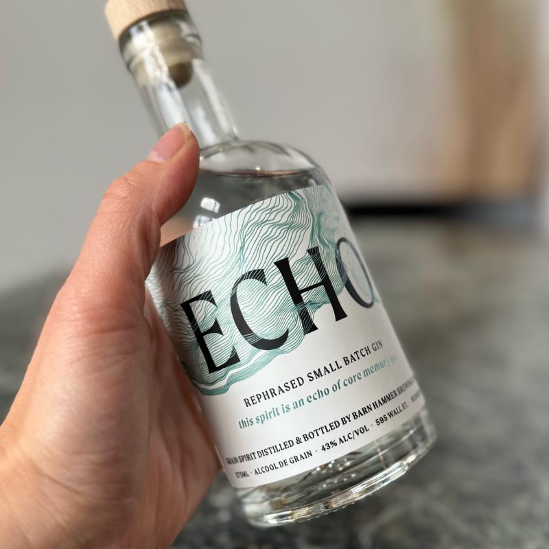 hand holding echo bottle